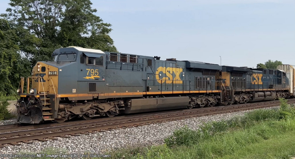 CSX 795 leads M215.